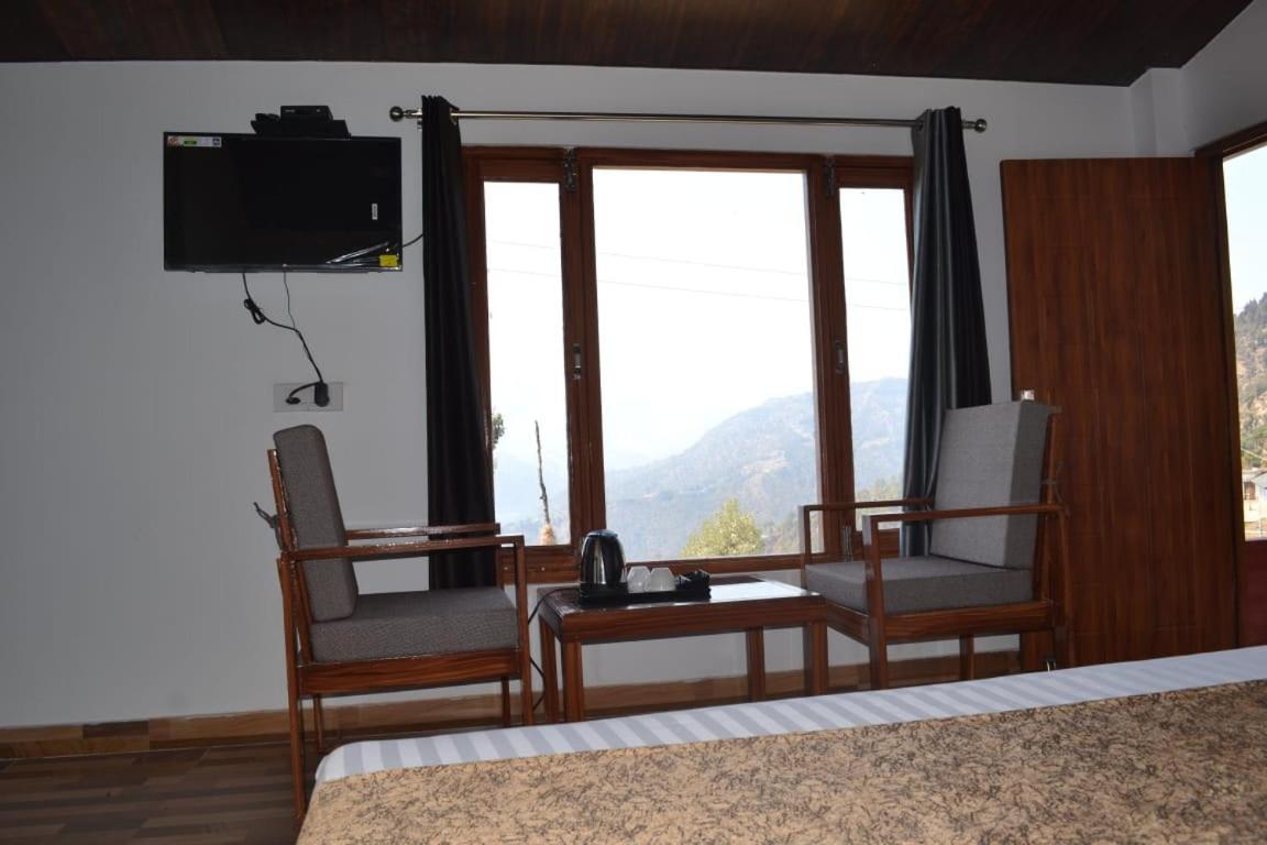 The Hillans Resort & Cottages Kanatal Exterior photo